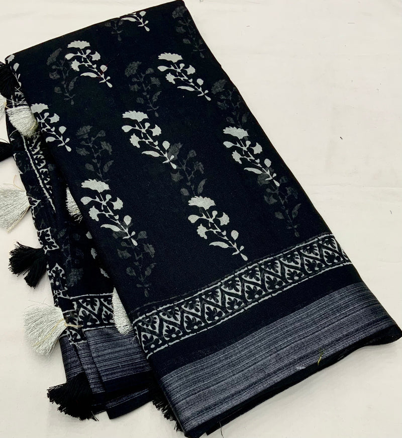 Soft Linen Saree with Zari Pattu Border & Batik Prints.